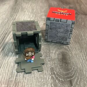 A Minecraft Movie Stone Block & Garrett Happy Meal Toy